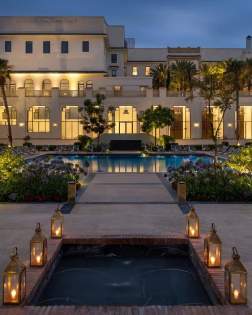 swimming pool and lanterns with a villa
