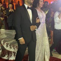 couple wearing wedding dress